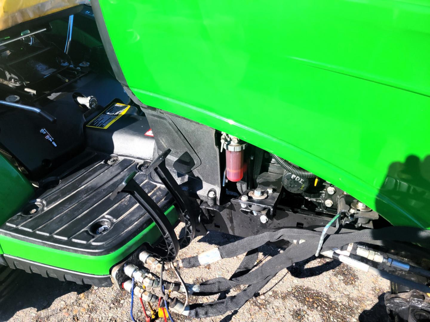 2018 Green /Yellow John Deere 1025R with an 3TNV80F-NCJT engine, Hydrostatic transmission, located at 450 N Russell, Missoula, MT, 59801, (406) 543-6600, 46.874496, -114.017433 - Only 106 Hours. Really Nice 2018 John Deere 4Wheel Drive 1025R Diesel Tractor. 25HP. Comes with John Deere 54" Front Snow Blower. Has Owners Manuals for the Tractor and the Blower. Lots of Specs one the pictures page. Excellent Condition. Plastic has never been off the seat. Does Not come with any o - Photo#3